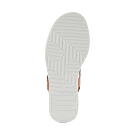 White sandal outsole with geometric tread pattern and a faint size 37 marking