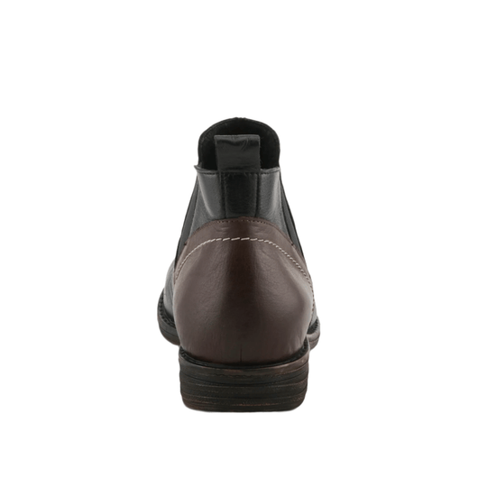 Brown and black ankle boot viewed from the back with pull tab and stacked heel