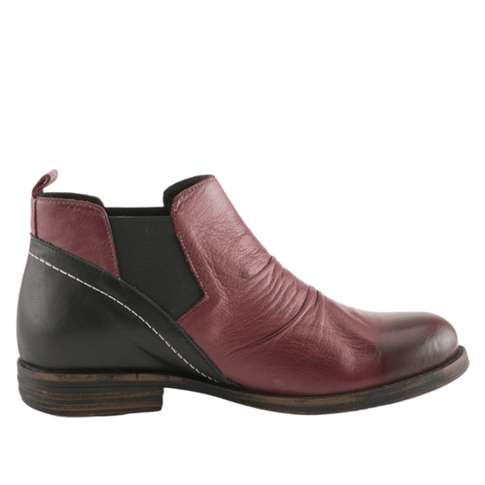 Burgundy and black leather ankle boot with elastic side panels and a low heel