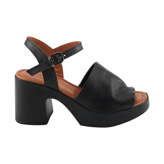 Black leather platform sandal with chunky heel, open toe, and ankle strap