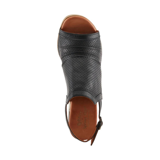 Black perforated slingback sandal with open toe and brown insole