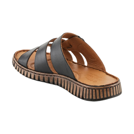 Black and tan strappy leather sandal with crossover straps and a ridged platform sole