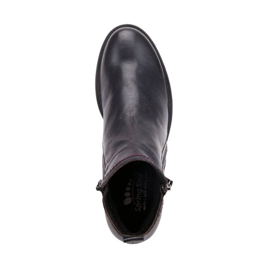 Black leather ankle boot with a rounded toe, side zipper, and pull tab