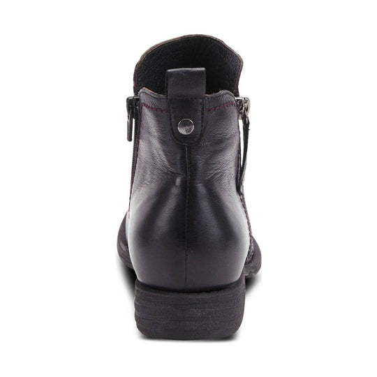 Black leather ankle boot shown from the back with a low heel and side zipper
