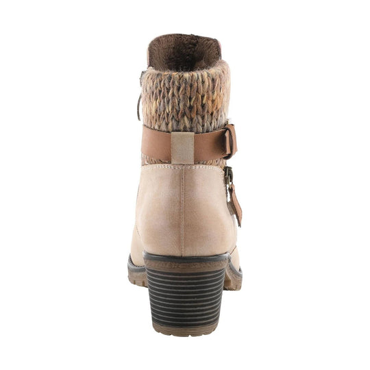 Beige ankle boot with faux fur cuff, side buckle strap, and chunky stacked heel, shown from the back