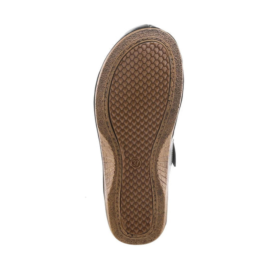 Brown shoe sole with honeycomb tread and size 37 marking