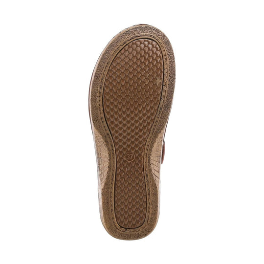 Brown textured shoe outsole with hex tread pattern and size 37 marking