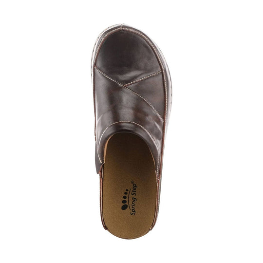 Brown leather slip-on clog with closed toe and open back, shown from above