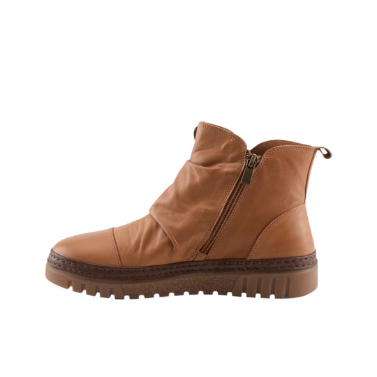 Tan leather ankle boot with side zipper and lug sole