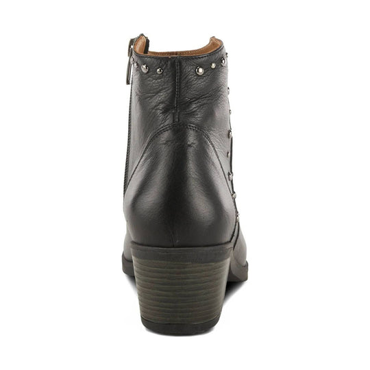 Black leather ankle boot with studded collar and chunky stacked heel, rear view