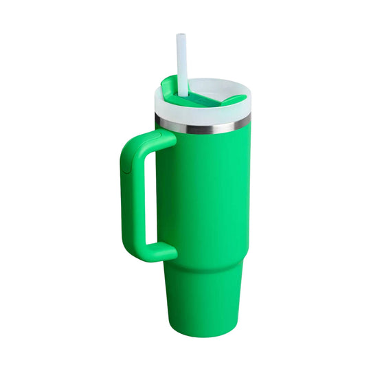 Green handled tumbler with a white lid, clear straw, and stainless steel band