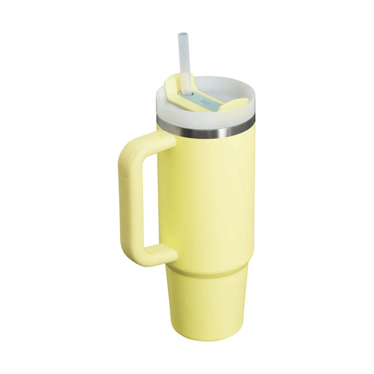 Yellow handled tumbler with a clear straw and translucent lid