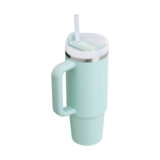 Light mint insulated tumbler with a handle, clear straw, and white lid