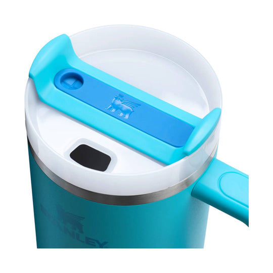 Turquoise insulated tumbler with clear lid, blue sliding handle, and side handle