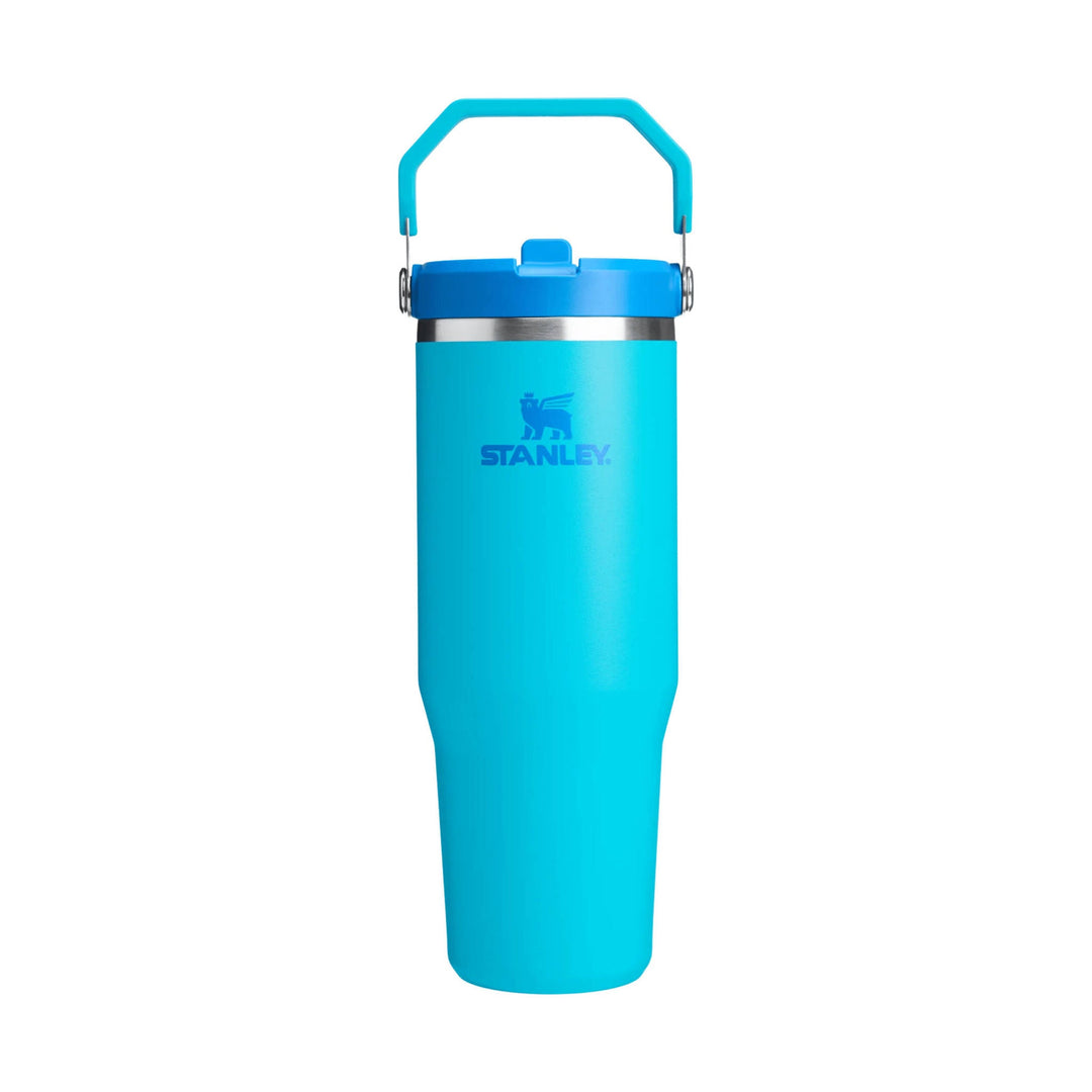 Turquoise insulated tumbler with blue lid and folding handle
