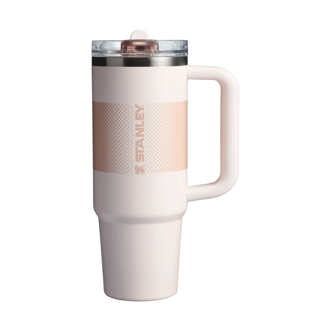 Tall off-white insulated tumbler with handle, clear lid, and vertical Stanley logo