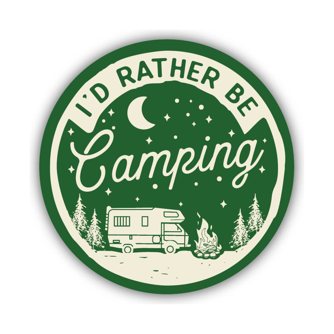 Round green-and-cream camping sticker with an RV, campfire, pine trees, moon, and stars