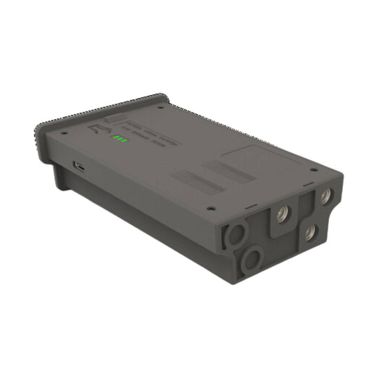 Gray rectangular battery cartridge with a side USB-C port, green indicator lights, and front metal terminals