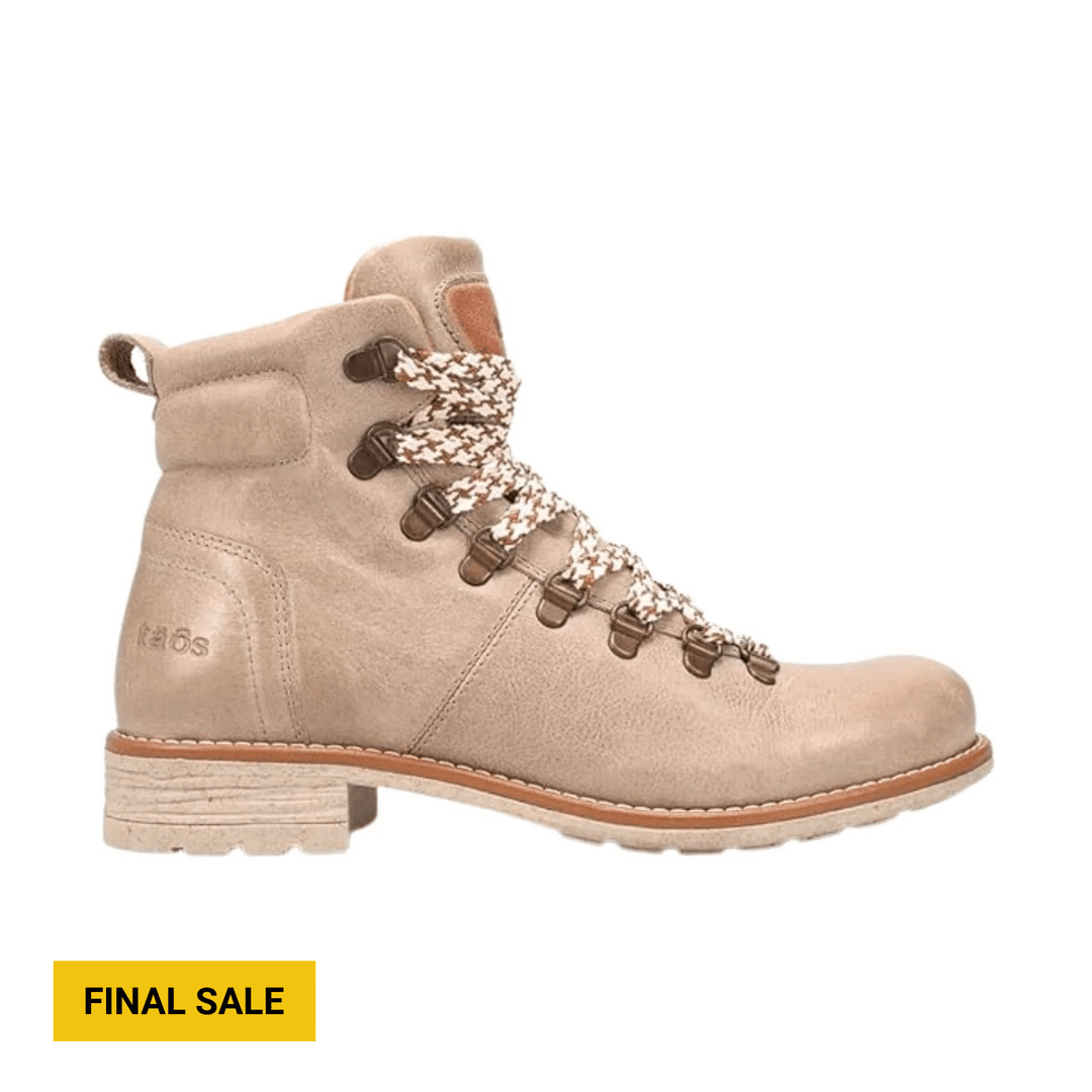 Beige ankle hiking boot with patterned laces, metal hooks, and a stacked heel