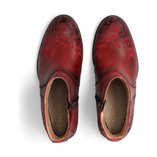 Red floral leather ankle boots with side zippers, top-down view
