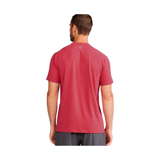 Man wearing a red short-sleeve athletic T-shirt, shown from the back