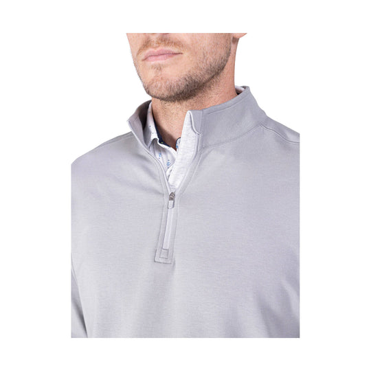 Light gray quarter-zip pullover with a stand collar and white patterned shirt peeking out at the neckline