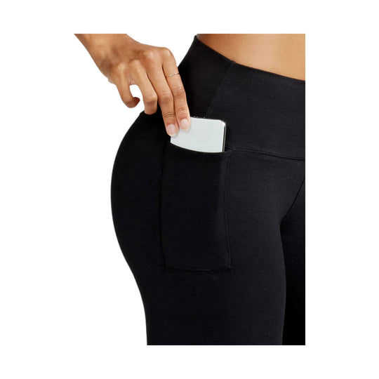 Black high-rise leggings with a side pocket, shown with a phone tucked into the pocket