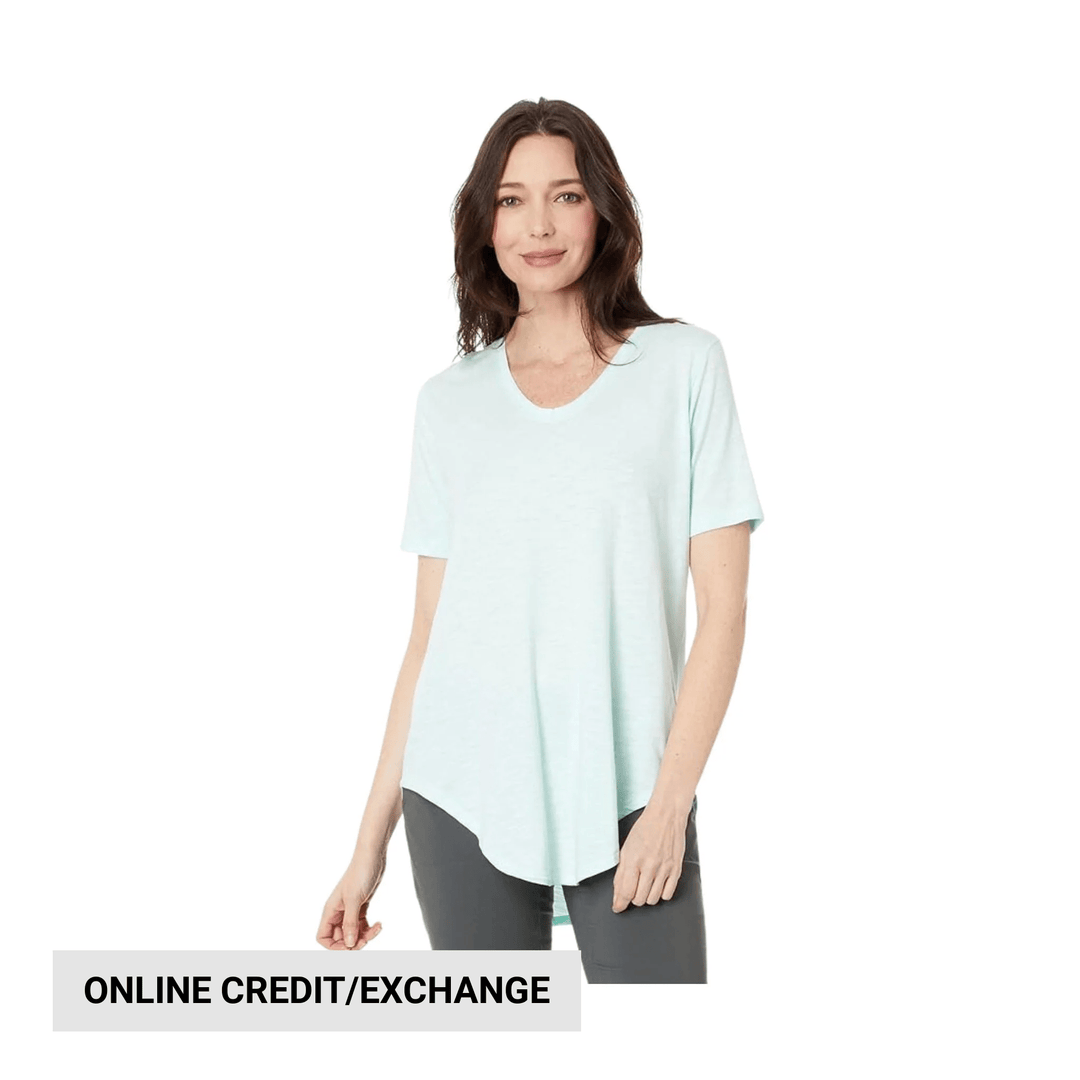 Light mint longline short-sleeve T-shirt on a model with online credit/exchange text