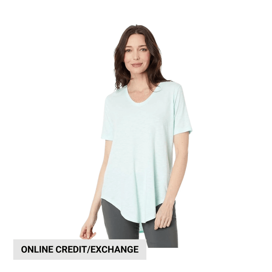 Light mint longline short-sleeve T-shirt on a model with online credit/exchange text