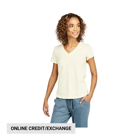 Light yellow V-neck short-sleeve T-shirt with blue pants, shown on a model