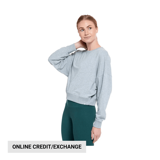 Light gray crewneck sweatshirt with long sleeves and dropped shoulders, shown with dark green leggings.