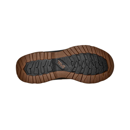 Outsole of a hiking boot with brown rubber tread and black center, showing the Teva logo.