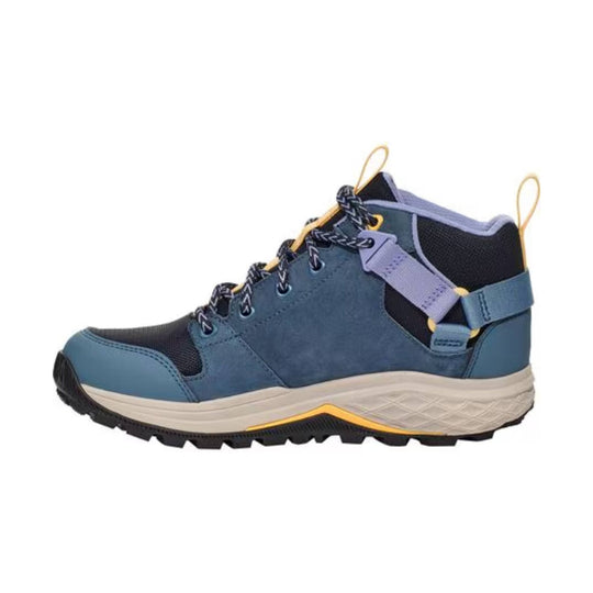Blue and black hiking boot with a rugged tread sole, bungee laces, and ankle pull tabs