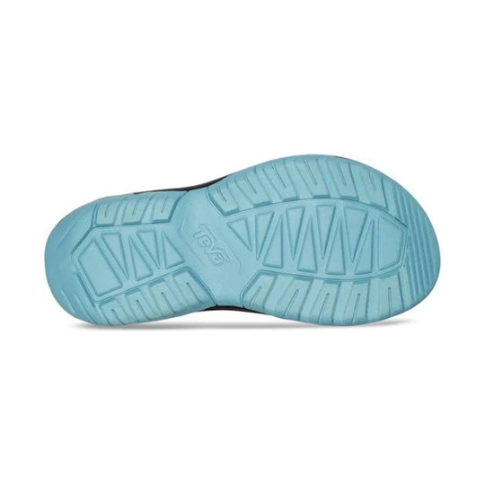Light blue sandal outsole with tread patterns and Teva logo