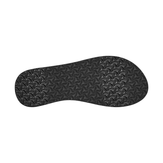Black sandal outsole with wavy tread pattern