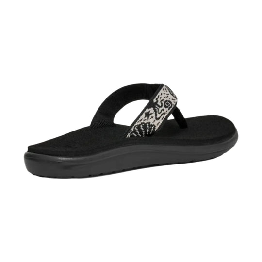 Black thong sandal with a patterned strap and thick cushioned sole, shown in side view