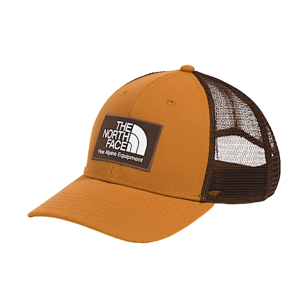 Tan and brown mesh trucker cap with a front logo patch