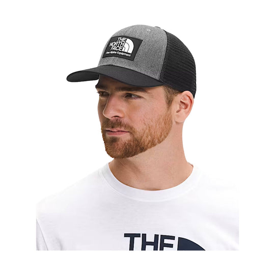 Black and gray trucker hat with The North Face patch logo