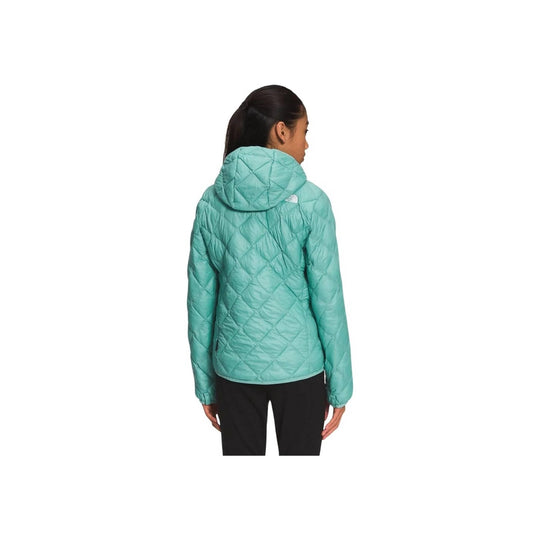 Teal quilted hooded jacket shown from the back