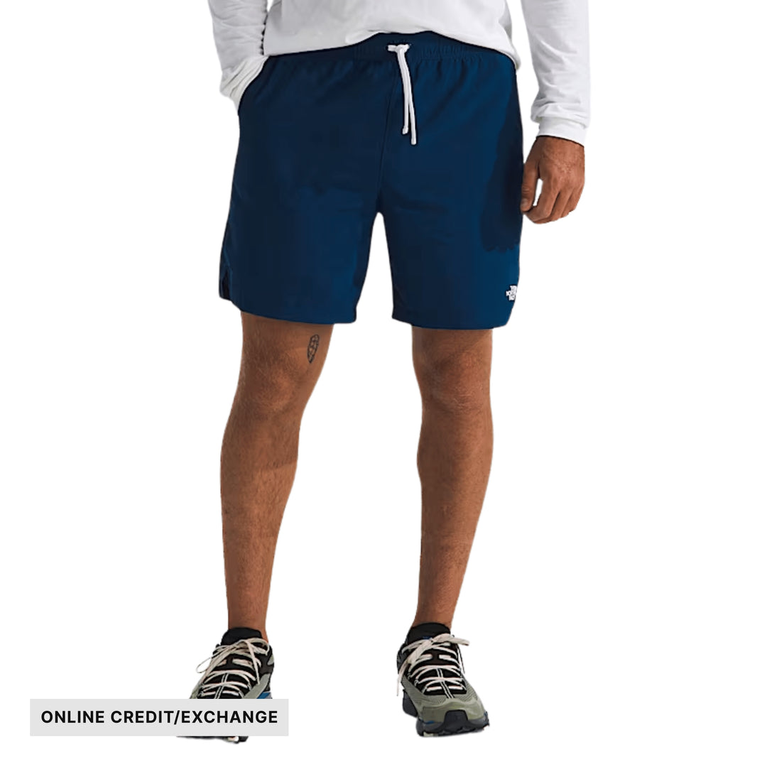 Navy athletic shorts with white drawstring, shown on a model