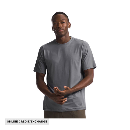 Gray short-sleeve athletic T-shirt on a model with ONLINE CREDIT/EXCHANGE text