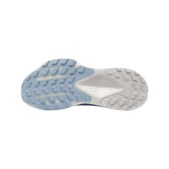 Trail running shoe outsole with blue forefoot tread and white heel tread