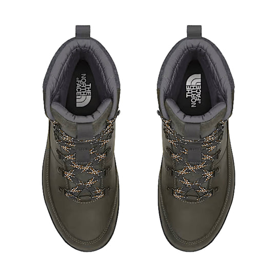 Pair of dark hiking boots shown from above with padded collars, rope laces, and The North Face logos on the insoles
