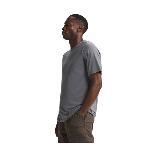 Gray short-sleeve crewneck shirt shown in side profile on a model