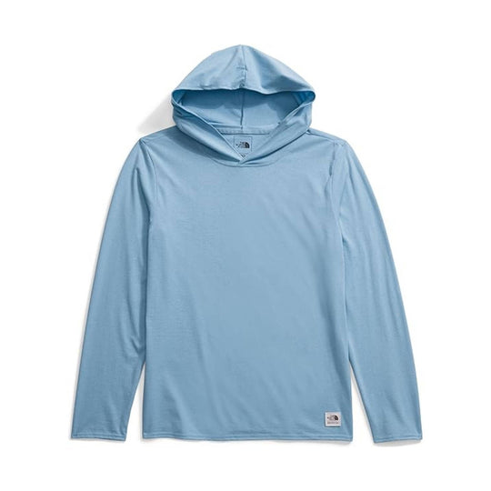 Light blue long-sleeve hooded shirt with a small logo patch at the hem