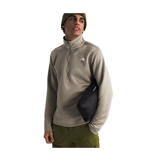 Beige quarter-zip fleece pullover with The North Face logo on the chest