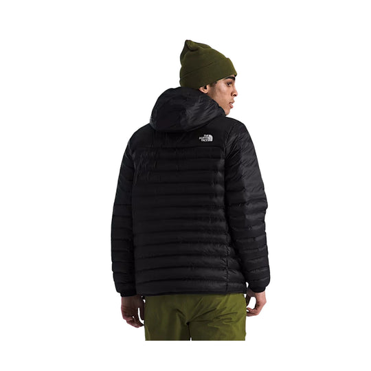 Black hooded puffer jacket shown from the back, with a small logo on the upper back.