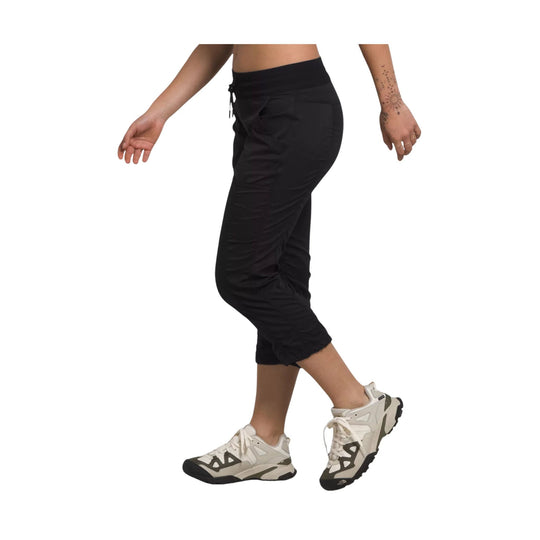 Black cropped hiking capri pants with elastic waistband and side tie detail