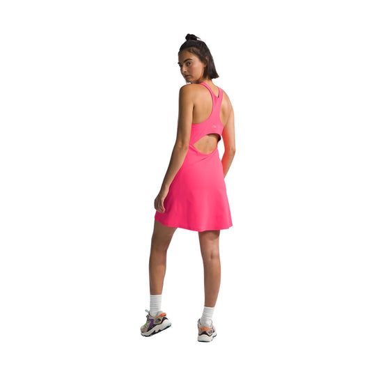 Pink sleeveless athletic dress with open back, shown from the back