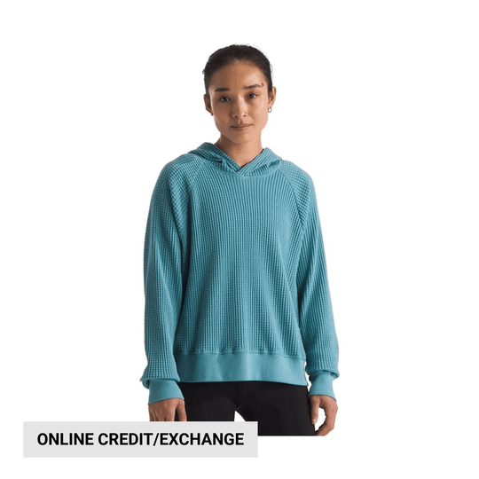 Teal waffle-knit hoodie with raglan sleeves and ribbed cuffs, shown front view